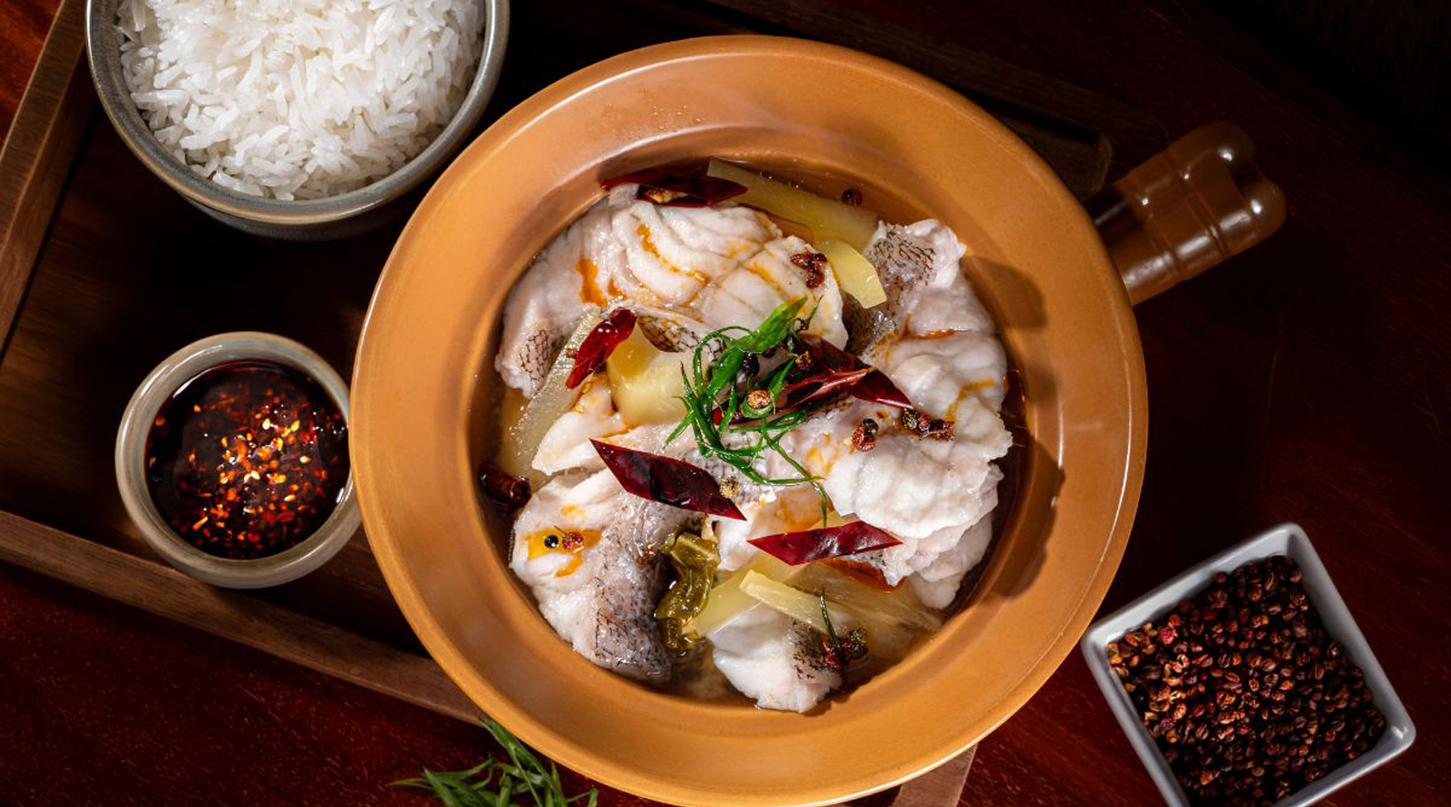 A Taste of Comfort: Braised Grouper with Preserved Mustard Greens in Clay Pot at Plate Restaurant